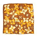 Jacqmar silk scarf with a floral design in browns and yellows