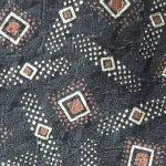 Vintage Yves Saint Laurent silk tie in brown and cream