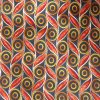 Valentino Italy silk satin tie with a graphic design in orange and gold on a dark backgrou
