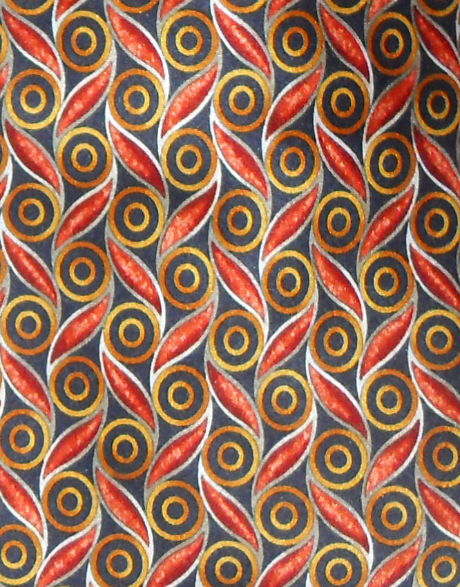 Valentino Italy silk satin tie with a graphic design in orange and gold on a dark backgrou