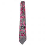 Propeller Cravatte British silk tie with bright pink flowers on a black and white background