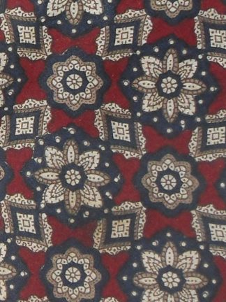 Vintage Lanvin silk tie with a floral deisgn in dark blue and taupe on a dark red background