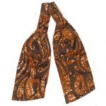 Bown silk cravat with a floral and paisley batik design