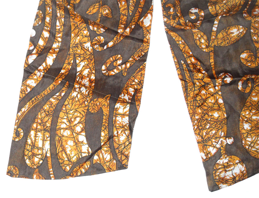 Bown silk cravat with a floral and paisley batik design