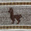 AAAA Peru hand loomed tie with a design of a llama