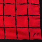 Red and black design silk scarf by Geraldine Paris