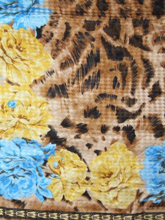 Animal print textured silk scarf with a blue and yellow flower design