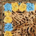 Animal print textured silk scarf with a blue and yellow flower design