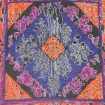 Lanvin silk scarf with a vibrant orange, purple, blue and black design