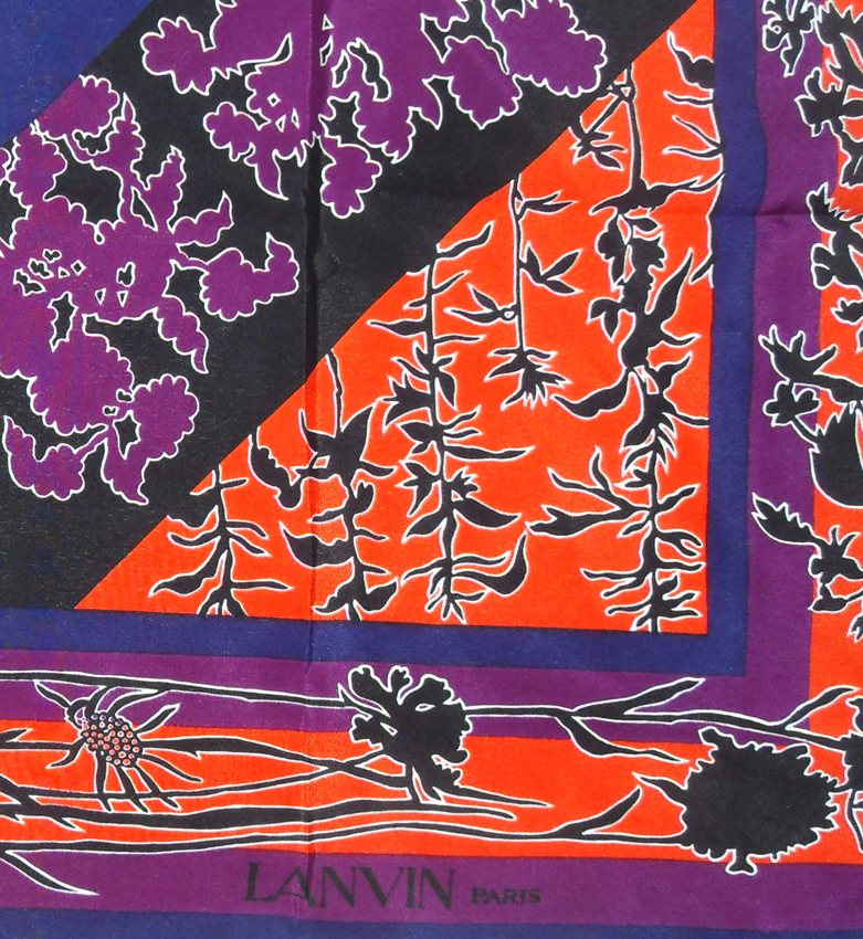 Lanvin silk scarf with a vibrant orange, purple, blue and black design