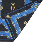 Cartier Silk scarf in a blue, black and gold design with the logo in the centre