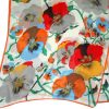 Large silk scarf with a vibrant floral design