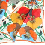 Large silk scarf with a vibrant floral design