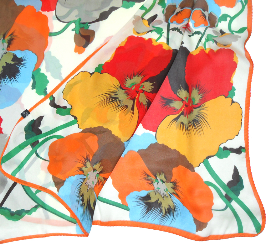 Large silk scarf with a vibrant floral design