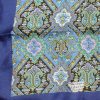 Liberty silk scarf with a blue border and a patterned central design