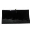 Black patent clutch bag with gold tone frame and clasp