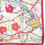 Longchamp silk scarf with a design of handbags and flowers