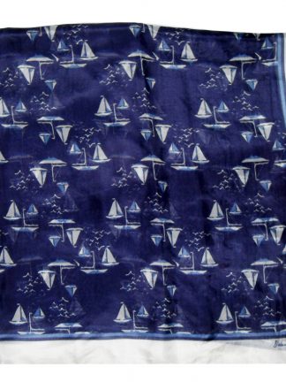 Sheer silk scarf with a design of sail boats on a dark blue background