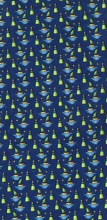 Boat and buoy designon a blue background silk tie