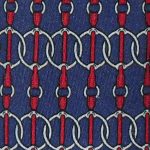 Equestrian horse tackle design silk tie on a blue background by Hermes