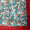 Liberty of London silk scarf with a bright floral design