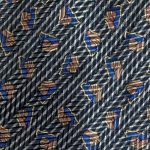 Lanving silk tie with a design in blue and copper
