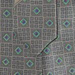 Grès Paris tie with intricate diamond and square design