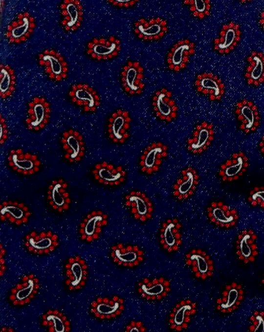 Dark blue narrow cravat with a small paisley design