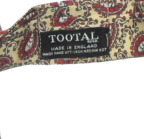 Vintage Tootal rayon cravat with a red and white paisley design on a yellow background