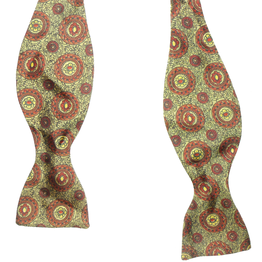 Vintage thistle end self tie bow tie with a design in browns and gold