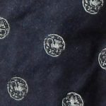 Dark blue silk tie with white circle design by Paul Smith, England