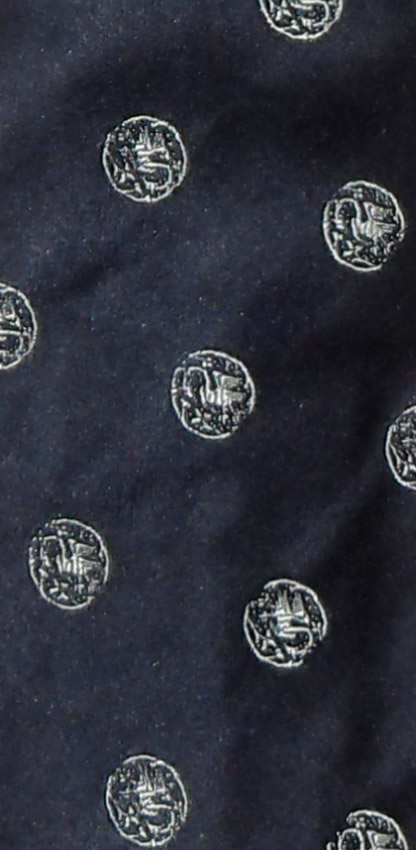 Dark blue silk tie with white circle design by Paul Smith, England
