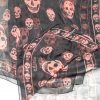 Long skull design scarf by Alexander McQueen