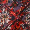 Vintage Liberty cotton tie with a floral design in reds, purples and yellows