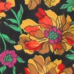 Vintage Liberty cotton tie with a floral design on a black background