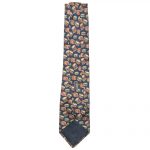 Harrods silk tie with a blue background and a design of drums