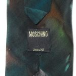 Vintage Moschino silk tie with a dark green background