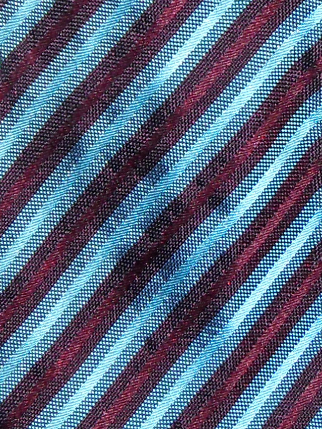 Blue and burgundy diagonal striped silk tie by Lacoste