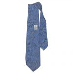 Blue background with sall white and yellow flower design silk tie by E G Cappelli