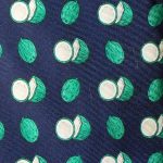 Yves Saint :Laurent green coconut on dark blue background design silk tie