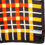 Odile St Germain Paris silk scarf with a yellow and red check design on a dark brown background
