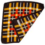 Odile St Germain Paris silk scarf with a yellow and red check design on a dark brown background