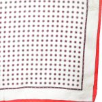 Hand rolled edge silk square with a red border and a cream and red design