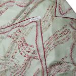 Richard Allan pale green silk scarf with a red design