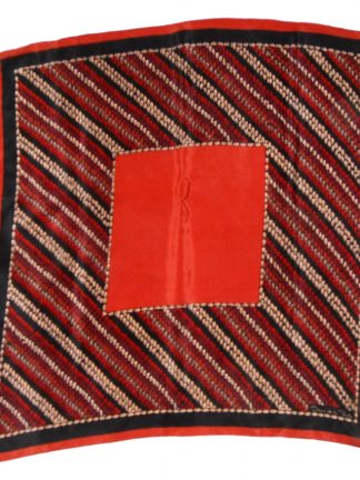 Oscar de la Renta silk scarf in a rust, red, black and gold design