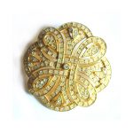 Gold tone metal and clear stone brooch