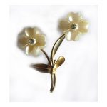 White flower brooch with clear stones
