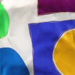 Brightly coloured circle design silk scarf