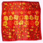 Tendenze rose design silk scarf on a red background
