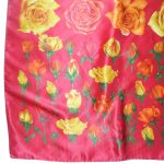 Tendenze rose design silk scarf on a red background
